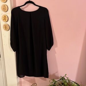 Size 8 H&M black dress in good used condition.